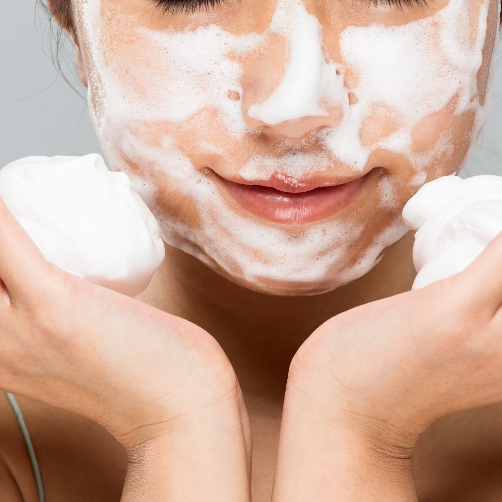 Woman,Putting,Foam,On,Face.